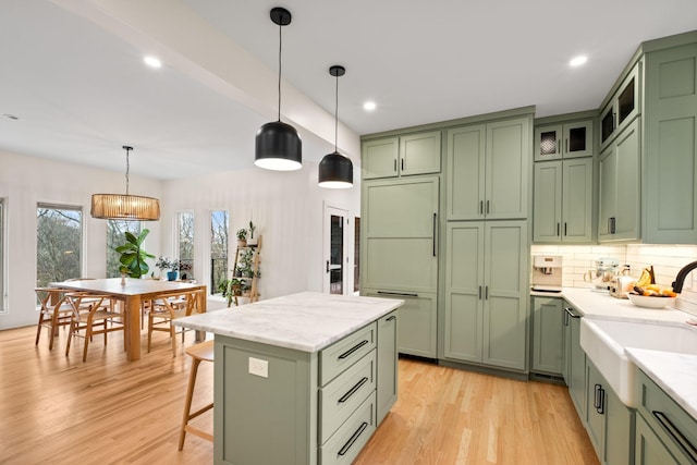 1122 Oman Dr, Brentwood, TN 37027 - kitchen featuring green cabinetry, a sink, light wood-style floors, and recessed lighting