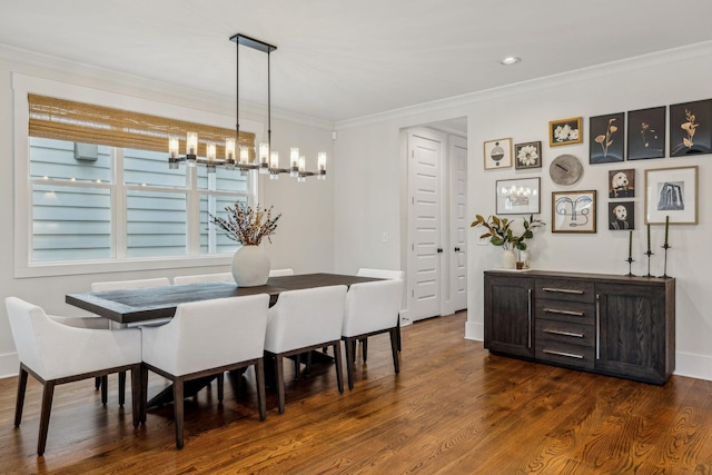 1547 Battlefield Dr, Nashville, TN 37215 - dining space with dark wood-style floors, a notable chandelier, crown molding, and baseboards
