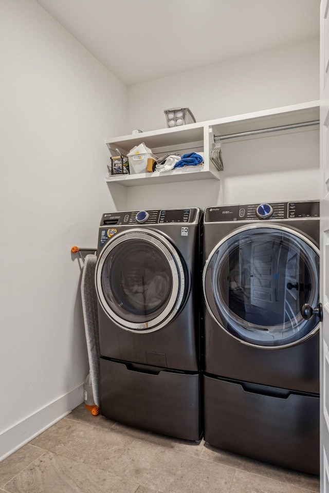 1547 Battlefield Dr, Nashville, TN 37215 - clothes washing area featuring independent washer and dryer, laundry area, and baseboards