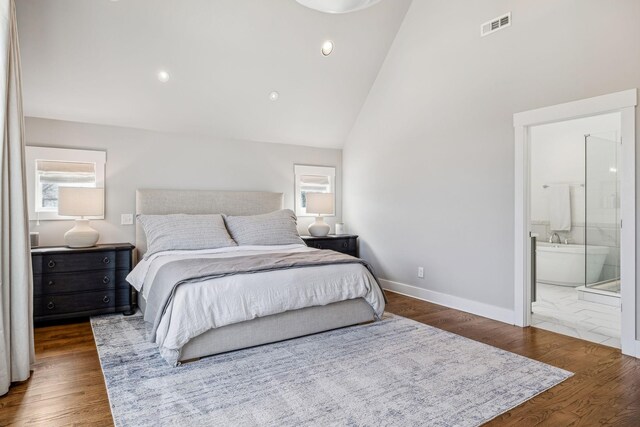 1547 Battlefield Dr, Nashville, TN 37215 - bedroom with wood finished floors, high vaulted ceiling, baseboards, and visible vents
