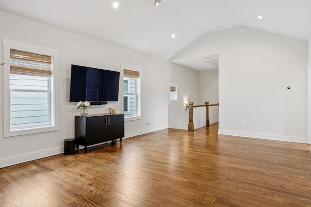 1547 Battlefield Dr, Nashville, TN 37215 - living room featuring plenty of natural light, baseboards, vaulted ceiling, and wood finished floors