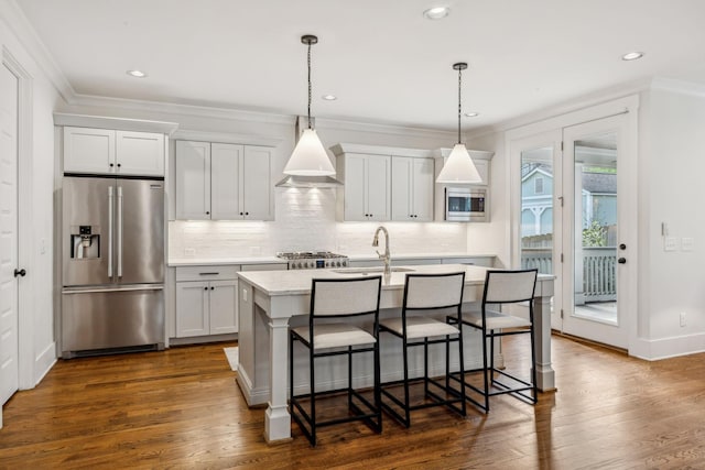 1547 Battlefield Dr, Nashville, TN 37215 - kitchen with light countertops, a sink, high end fridge, a center island with sink, and wall chimney range hood