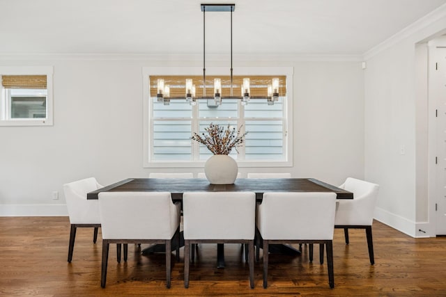1547 Battlefield Dr, Nashville, TN 37215 - dining area featuring baseboards, wood finished floors, ornamental molding, and an inviting chandelier