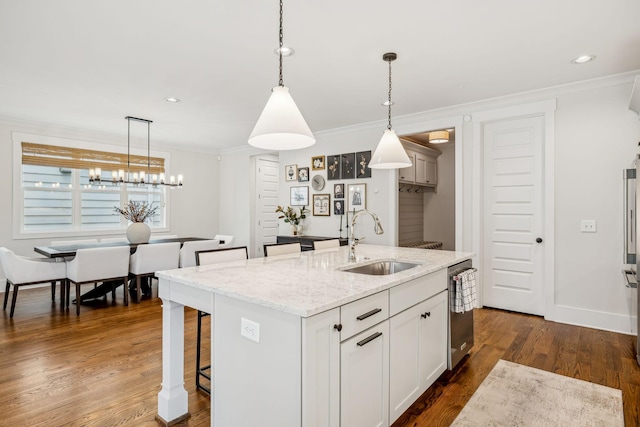 1547 Battlefield Dr, Nashville, TN 37215 - kitchen with dark wood-style flooring, a sink, stainless steel dishwasher, and crown molding