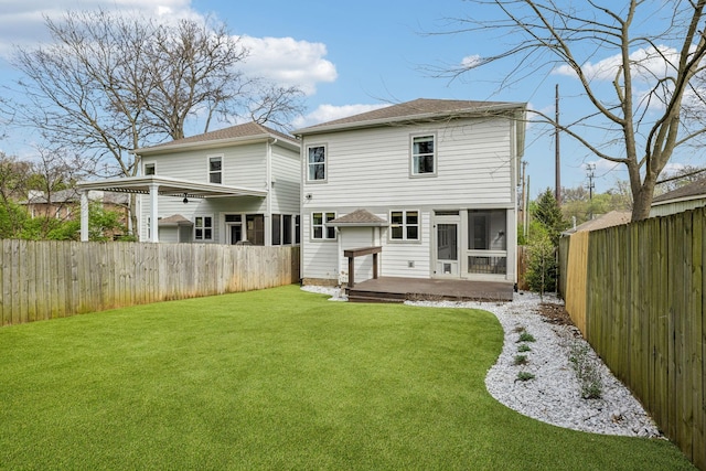 1547 Battlefield Dr, Nashville, TN 37215 - back of house featuring a fenced backyard, a lawn, and a sunroom