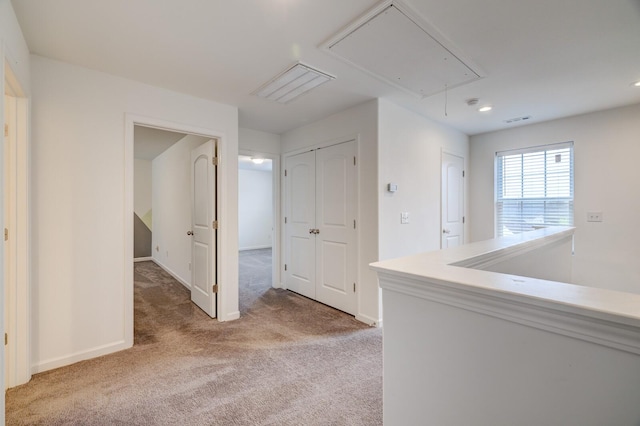 1006 Chisolm Trl, Goodlettsville, TN 37072 - corridor with baseboards, visible vents, attic access, and light carpet