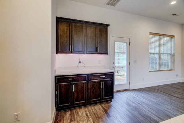 1006 Chisolm Trl, Goodlettsville, TN 37072 - kitchen featuring light countertops, wood finished floors, baseboards, and visible vents