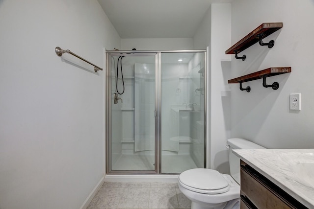 1006 Chisolm Trl, Goodlettsville, TN 37072 - bathroom featuring vanity, toilet, baseboards, tile patterned floors, and a stall shower