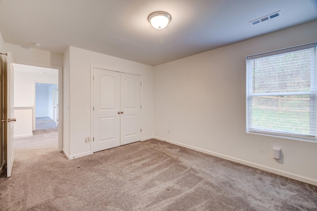 1006 Chisolm Trl, Goodlettsville, TN 37072 - unfurnished bedroom with baseboards, visible vents, a closet, and carpet