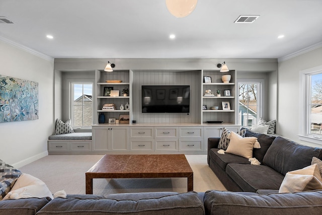 920A Kirkwood Ave, Nashville, TN 37204 - living room featuring visible vents, crown molding, and light colored carpet
