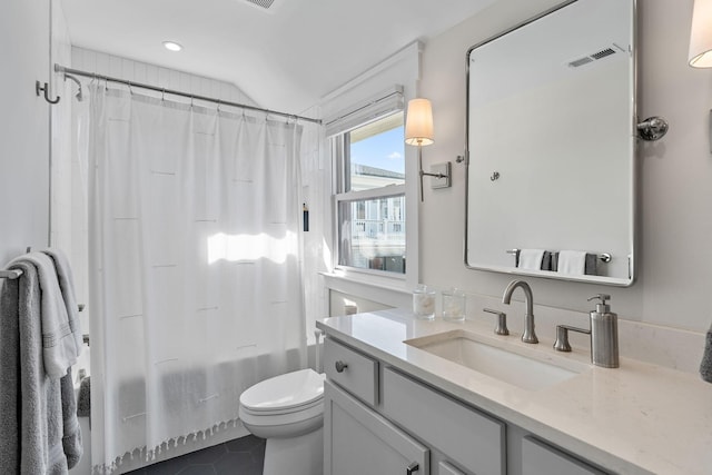 920A Kirkwood Ave, Nashville, TN 37204 - full bathroom featuring visible vents, toilet, tile patterned floors, vanity, and shower / bathtub combination with curtain