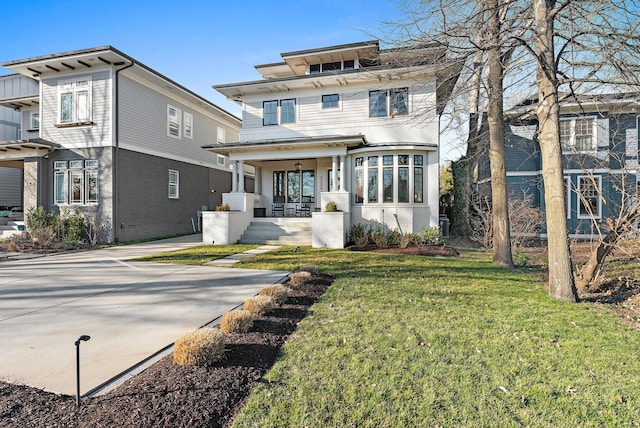920A Kirkwood Ave, Nashville, TN 37204 - back of house with a lawn and covered porch