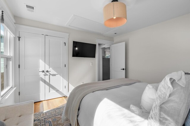 920A Kirkwood Ave, Nashville, TN 37204 - bedroom with a closet, visible vents, and wood finished floors