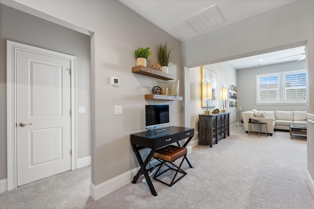 office space with light colored carpet and baseboards