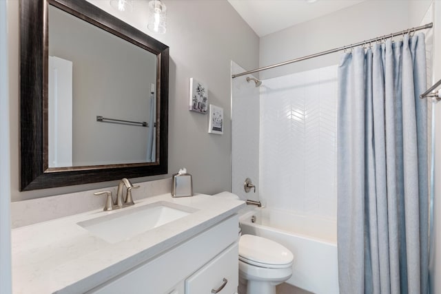bathroom with shower / tub combo, toilet, and vanity