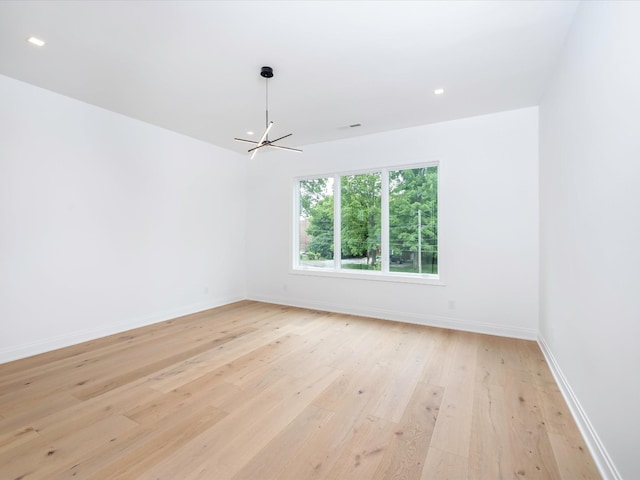 3848 Granny White Pike, Nashville, TN 37204 - unfurnished room featuring a chandelier, light wood-type flooring, baseboards, and recessed lighting