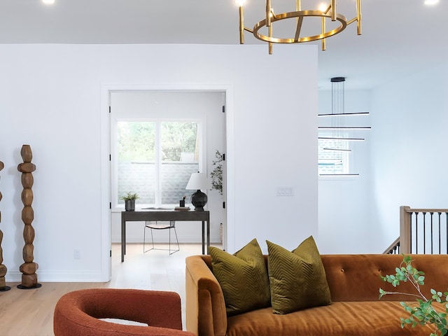 3848 Granny White Pike, Nashville, TN 37204 - living area featuring a chandelier, wood finished floors, and baseboards