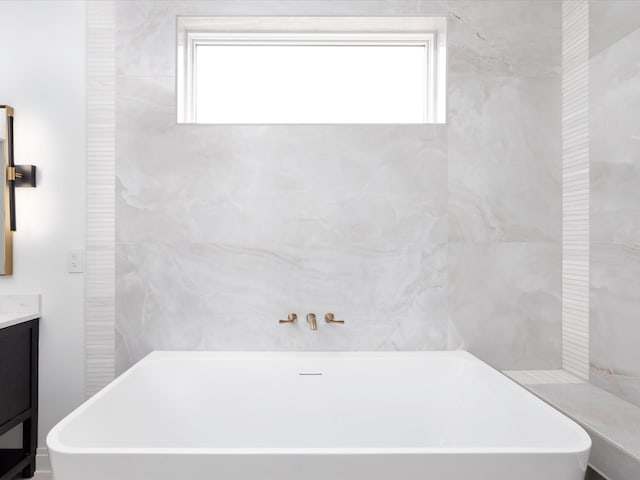 3848 Granny White Pike, Nashville, TN 37204 - bathroom with a freestanding tub, vanity, and healthy amount of natural light