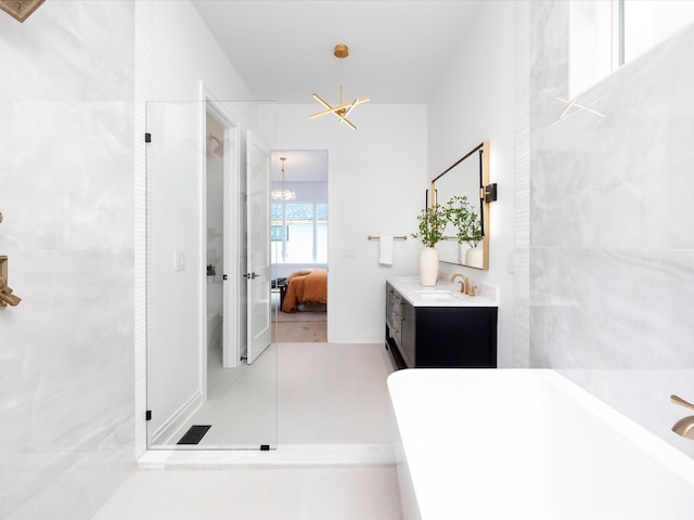 3848 Granny White Pike, Nashville, TN 37204 - bathroom with a chandelier, connected bathroom, vanity, and a walk in shower