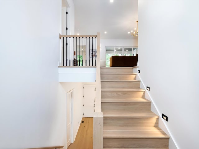 3848 Granny White Pike, Nashville, TN 37204 - stairway with wood finished floors, a chandelier, and recessed lighting