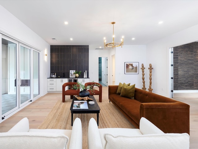 3848 Granny White Pike, Nashville, TN 37204 - living area featuring light wood finished floors, a chandelier, and recessed lighting