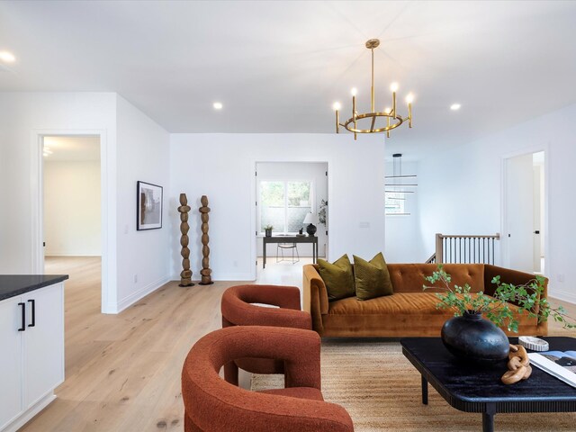 3848 Granny White Pike, Nashville, TN 37204 - living room featuring a chandelier, light wood-style flooring, recessed lighting, and baseboards