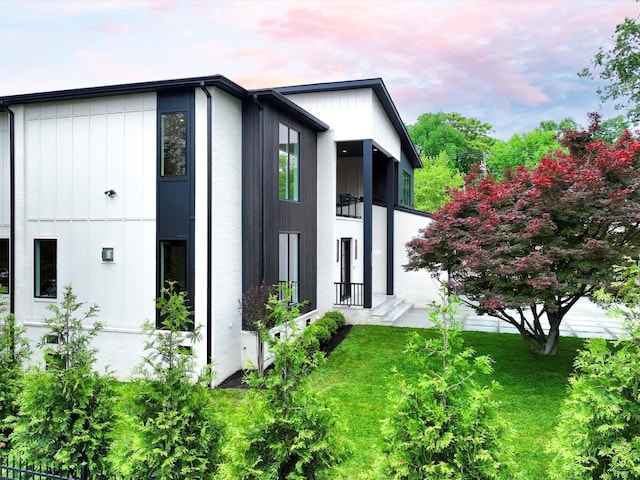 3848 Granny White Pike, Nashville, TN 37204 - back of house with a lawn and board and batten siding