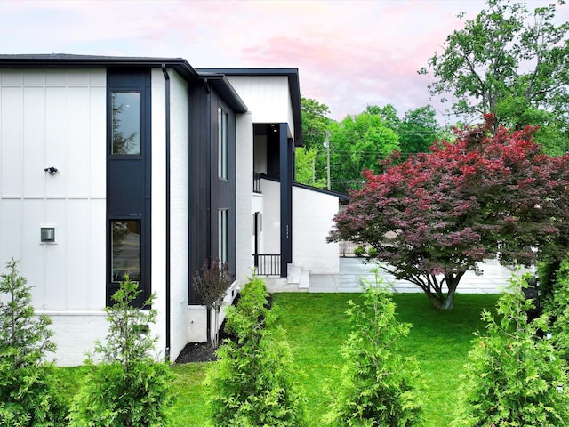 3848 Granny White Pike, Nashville, TN 37204 - property exterior at dusk with a lawn