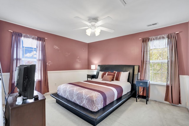 133 Grove Ln S, Hendersonville, TN 37075 - bedroom featuring visible vents, a wainscoted wall, a ceiling fan, and carpet flooring
