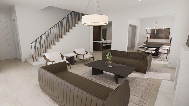 825B Kirkwood Ave, Nashville, TN 37204 - living area with stairs, a notable chandelier, and light wood-style flooring