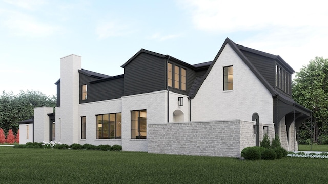825B Kirkwood Ave, Nashville, TN 37204 - view of property exterior with brick siding, a lawn, and a chimney