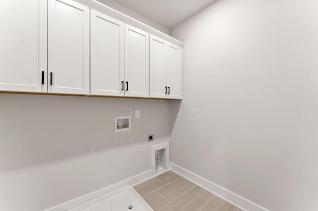 2615 Wilkinson Pike Unit 7A, Murfreesboro, TN 37129 - laundry area featuring cabinet space, hookup for an electric dryer, and washer hookup