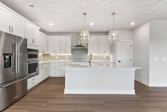 2615 Wilkinson Pike Unit 7A, Murfreesboro, TN 37129 - kitchen featuring stainless steel appliances, wall chimney exhaust hood, recessed lighting, light countertops, and backsplash