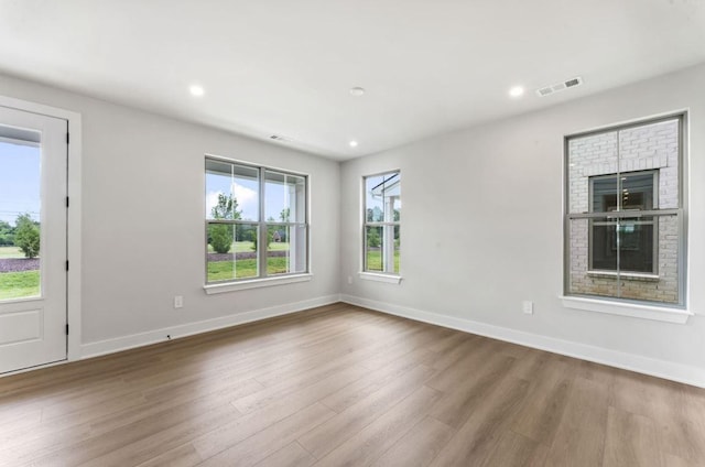 2615 Wilkinson Pike Unit 7A, Murfreesboro, TN 37129 - empty room with wood finished floors and recessed lighting