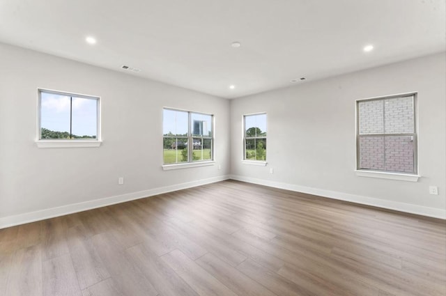 2615 Wilkinson Pike Unit 7A, Murfreesboro, TN 37129 - empty room featuring wood finished floors and recessed lighting