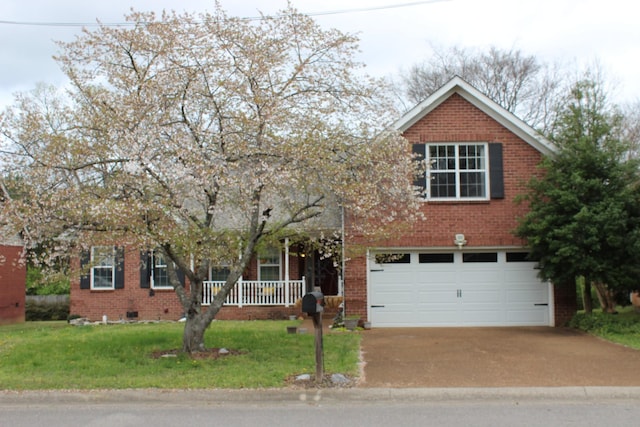 6309 Paddington Way, Antioch, TN 37013 - view of front of house featuring brick siding, a front lawn, and concrete driveway
