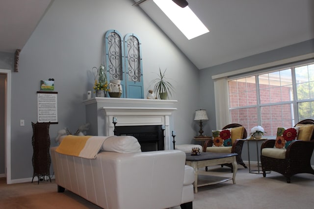 6309 Paddington Way, Antioch, TN 37013 - living room featuring baseboards, a fireplace, a skylight, high vaulted ceiling, and carpet