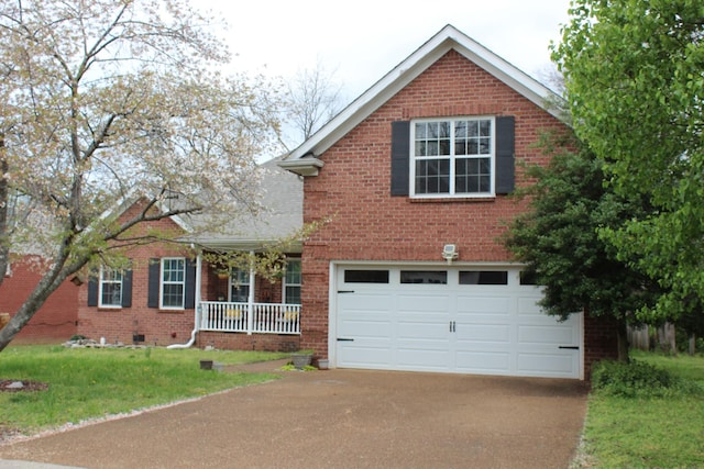 6309 Paddington Way, Antioch, TN 37013 - traditional home with brick siding, driveway, an attached garage, and covered porch