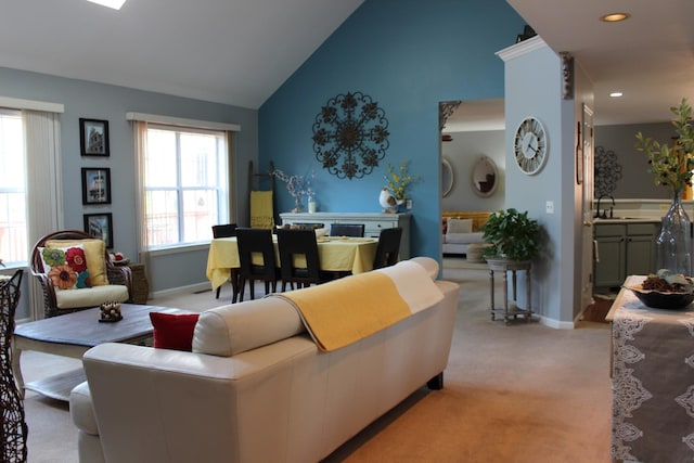 6309 Paddington Way, Antioch, TN 37013 - living area with high vaulted ceiling, recessed lighting, light colored carpet, and baseboards