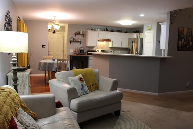 6309 Paddington Way, Antioch, TN 37013 - living area with a notable chandelier and baseboards