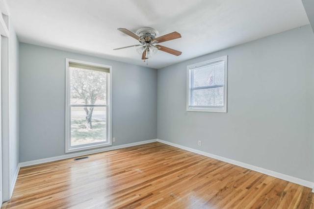 6004 Hawkdale Dr, Nashville, TN 37211 - spare room with a ceiling fan, wood finished floors, baseboards, and visible vents