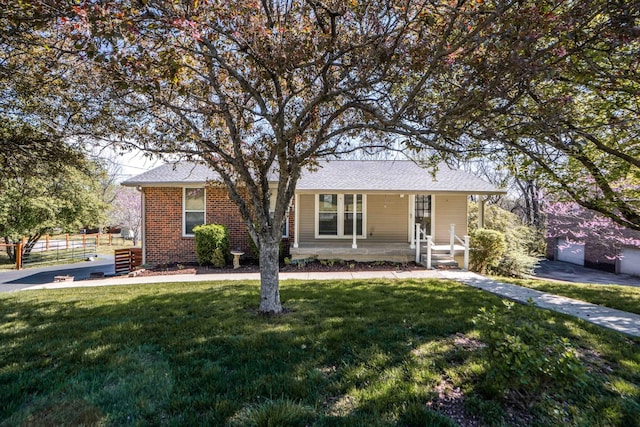 6004 Hawkdale Dr, Nashville, TN 37211 - ranch-style home with brick siding and a front yard