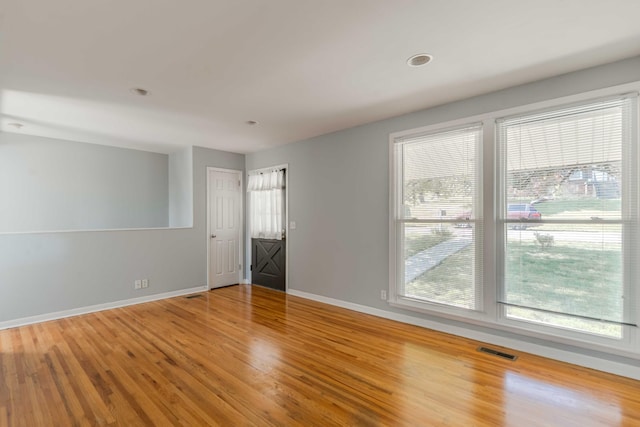 6004 Hawkdale Dr, Nashville, TN 37211 - empty room with baseboards, visible vents, and wood finished floors