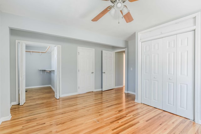 6004 Hawkdale Dr, Nashville, TN 37211 - unfurnished bedroom with baseboards, light wood-style flooring, and a ceiling fan