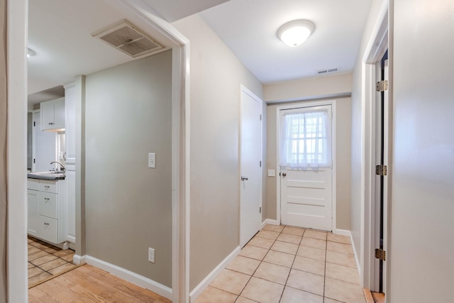 6004 Hawkdale Dr, Nashville, TN 37211 - entryway with light tile patterned floors, baseboards, and visible vents