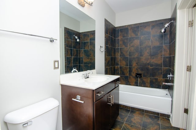 bathroom with toilet, bathing tub / shower combination, and vanity