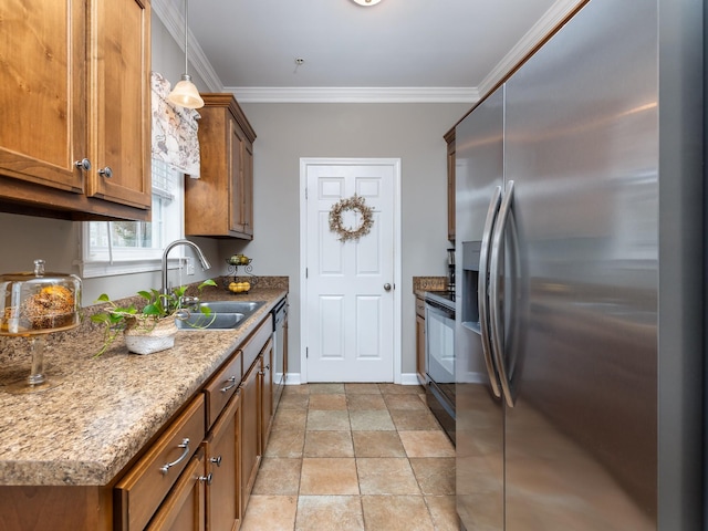 kitchen with brown cabinets, stainless steel fridge with ice dispenser, a sink, and ornamental molding