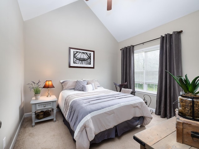 bedroom featuring baseboards, a ceiling fan, light colored carpet, and lofted ceiling