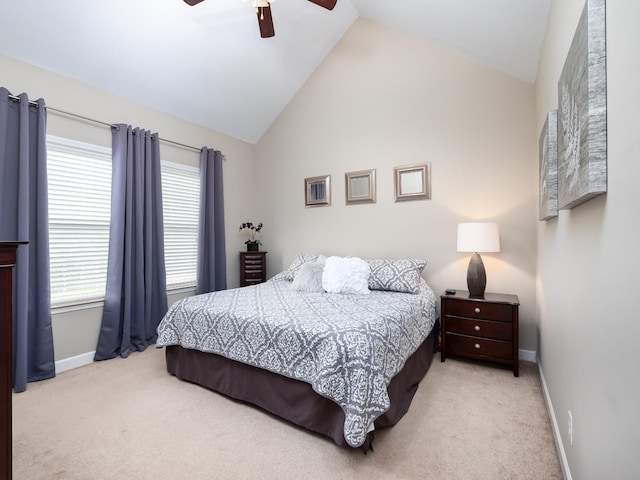 bedroom with carpet floors, baseboards, ceiling fan, and vaulted ceiling