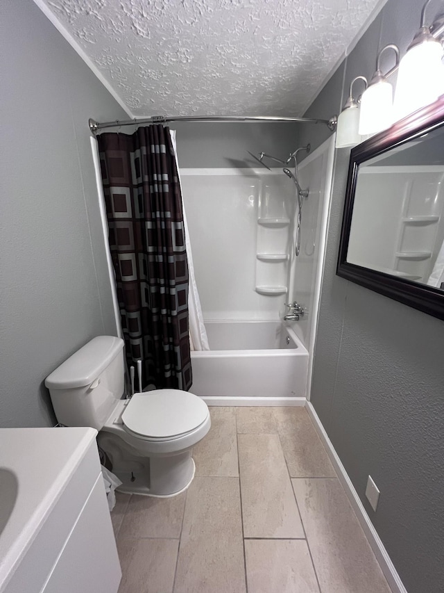 full bath featuring a textured ceiling, toilet, shower / bath combo, and vanity